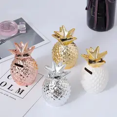 LOVE HOME DECO & LIVING - Alcancía de Piña Dorada