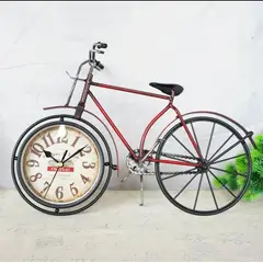 GENERICO - RELOJ VINTAGE SOBRE MESA MODELO BICICLETA ROJA RETRO METAL