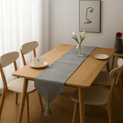 ARMONIA - Corredor de mesa gris lino 180x33 cm con borlas
